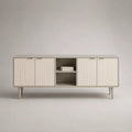 Meuble TV buffet bas en MDF blanc cassé avec portes rainurées niche centrale et pieds dorés 180 x 40 x 55 cm