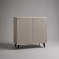 Buffet de salle à manger 2 portes en MDF beige avec façades rainurées et pieds en acier noir et doré 140 x 40 x 85 cm